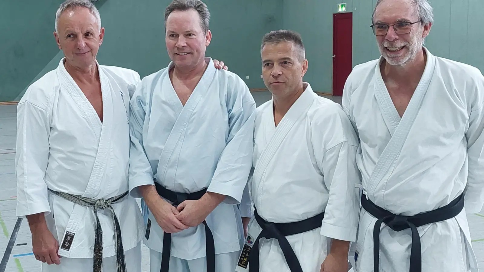 Helmut Körber (7. Dan, links) erteilte die Lizenzen an (von links) Frank Schneider (2. Dan), René Mros (2. Dan) und Norbert Wittmann (3. Dan). (Foto: Budo-Verein Herrsching e.V.)