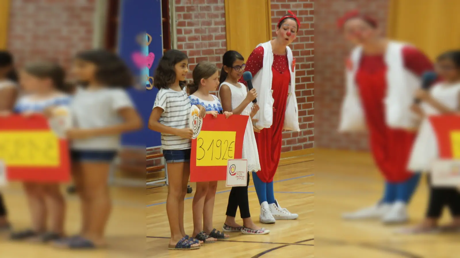 Stolze 3192 Euro haben die Schüler der Grundschule an der Oberföhringer Straße für die KlinikClowns bei ihrem Spendenlauf gesammelt. (Foto: Sinast)